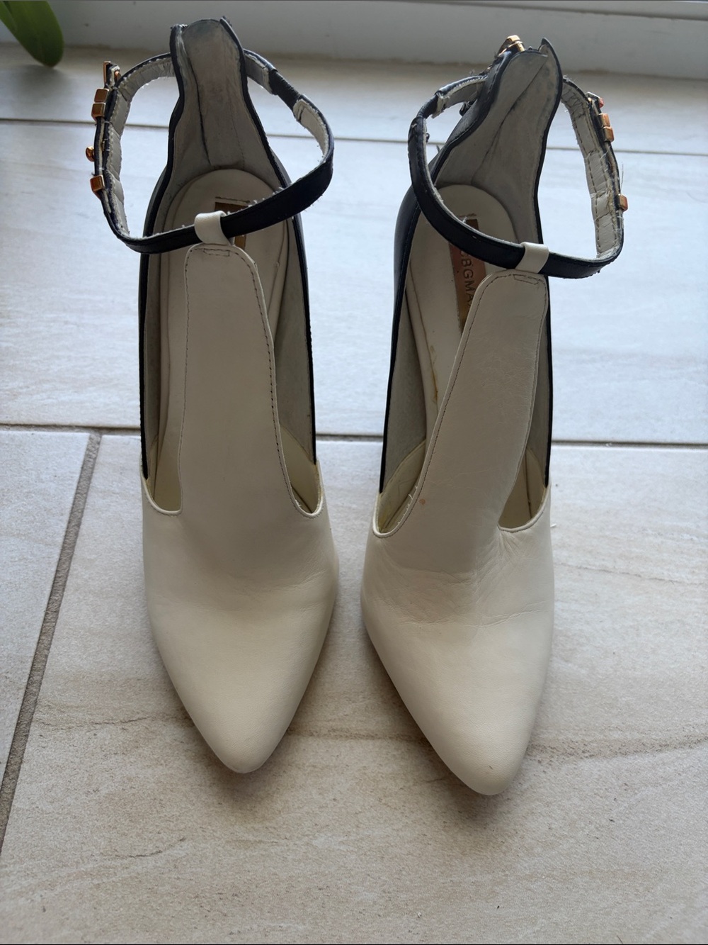 BCBGMaxAzria White Pointed Toe Ankle-Strap Heels with Black Accents